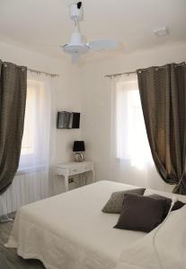 Postel nebo postele na pokoji v ubytování B&B Casa Gaia