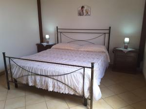 Letto o letti in una camera di Il Rustico di Pino