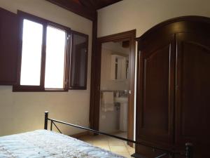 Letto o letti in una camera di Il Rustico di Pino