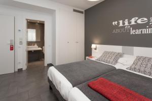 Posteľ alebo postele v izbe v ubytovaní 08028 Apartments