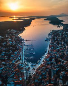 an aerial view of a city at sunset at Apartment Lavanda in Mali Lošinj