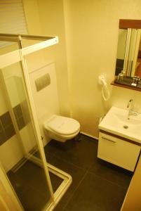 Koupelna v ubytování Mini Hotel