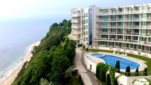 a view of a hotel and the ocean at Silver Beach Delux Apartment in Byala