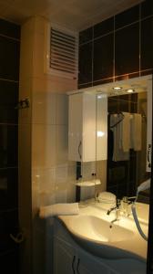 חדר רחצה ב-Palmira Hotel