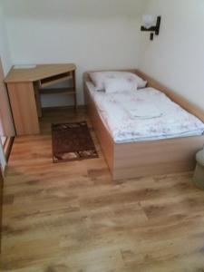 Posteľ alebo postele v izbe v ubytovaní Ádám Vendégház