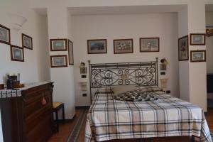 Кровать или кровати в номере Bella Baia Relais