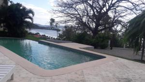 Swimming pool sa o malapit sa Oceanica Resort Flamingo