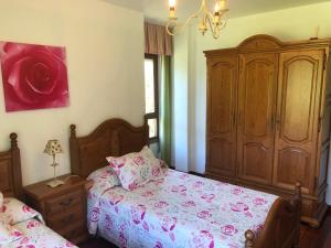 Łóżko lub łóżka w pokoju w obiekcie Casa Mieses