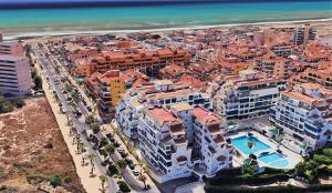 Nespecifikovaný výhled na destinaci La Mata nebo výhled na město při pohledu z apartmánu