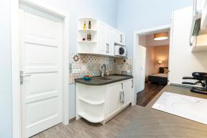 Η κουζίνα ή μικρή κουζίνα στο D8 Design Apartment & Studio