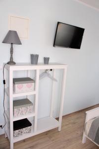 Telewizja i/lub zestaw kina domowego w obiekcie Willa Idylla
