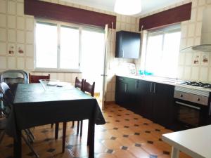 Kuchnia lub aneks kuchenny w obiekcie Piso con excelentes vistas