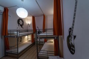 Postel nebo postele na pokoji v ubytování Pijama Hostel