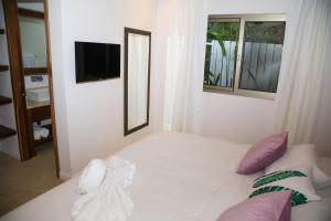 Postel nebo postele na pokoji v ubytování Casa Keshet