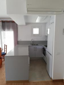 Kuchyňa alebo kuchynka v ubytovaní Live Salou Apartment