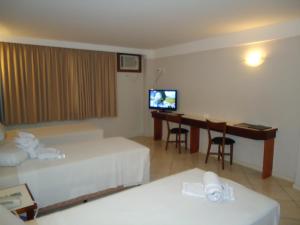 Letto o letti in una camera di Hotel Minuano