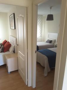 Ein Bett oder Betten in einem Zimmer der Unterkunft Cuesta del Tajillo