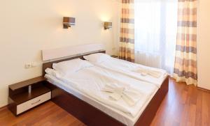 A bed or beds in a room at Sea View Rental Front Beach