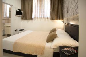 Voodi või voodid majutusasutuse Apartment & Room Split Lea toas