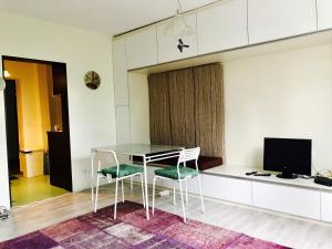A television and/or entertainment centre at Modern Studio 20 Meters from Mladost 1 Metro Station