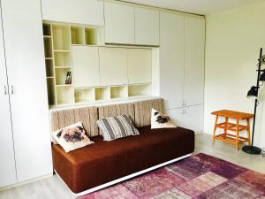 A seating area at Modern Studio 20 Meters from Mladost 1 Metro Station