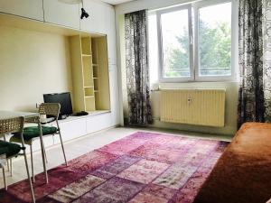 A seating area at Modern Studio 20 Meters from Mladost 1 Metro Station