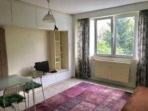 A seating area at Modern Studio 20 Meters from Mladost 1 Metro Station