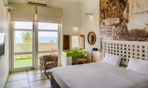 Postel nebo postele na pokoji v ubytování Hotel J Negombo + 28 fotografií