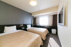 Postel nebo postele na pokoji v ubytování Hotel nanvan浜名湖 + 27 fotografií