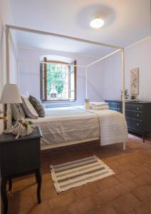 Кровать или кровати в номере Il Prunaio