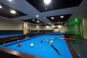 a pool room with billiard balls on a table at Muju Ilsung Condo in Muju