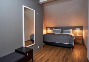 Letto o letti in una camera di Hotel Berg by Keflavik Airport