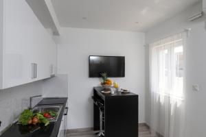 Kuchyň nebo kuchyňský kout v ubytování Apartments Siblings