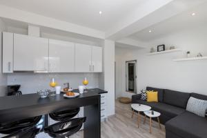 Kuchyň nebo kuchyňský kout v ubytování Apartments Siblings