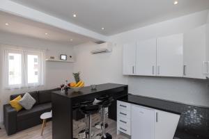 Kuchyň nebo kuchyňský kout v ubytování Apartments Siblings