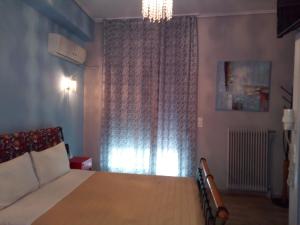 Posteľ alebo postele v izbe v ubytovaní Zappion Hotel