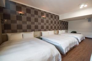 Postel nebo postele na pokoji v ubytování Lech Hotel