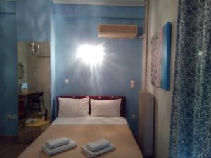 Posteľ alebo postele v izbe v ubytovaní Zappion Hotel