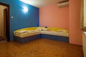 Postel nebo postele na pokoji v ubytování Hotel Orchidea
