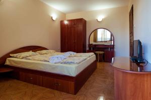 Postel nebo postele na pokoji v ubytování Hotel Orchidea