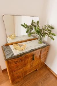 Ett badrum på S'Alighera Guest House