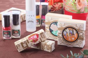 a group ofbranded boxes sitting on a table at Hotel Binario Saga Arashiyama in Kyoto