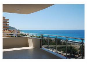 a balcony with a view of the ocean at Yenisey Residence 2 in Mahmutlar