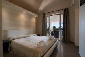 Postel nebo postele na pokoji v ubytování B&B Nacorè