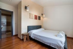 Postel nebo postele na pokoji v ubytování B&B Nacorè + 37 fotografií