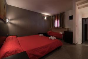 Postel nebo postele na pokoji v ubytování B&B Nacorè