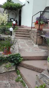 a set of stone steps in front of a house at Ferienwohnung Belle Vue in Bernkastel-Kues