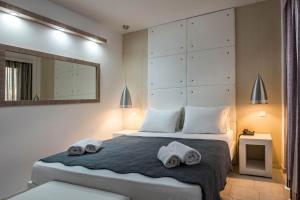 Postel nebo postele na pokoji v ubytování Galaxy Hotel