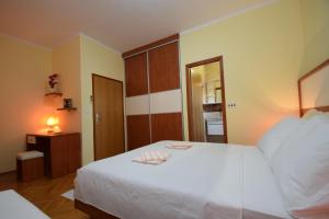 Postel nebo postele na pokoji v ubytování Guest house Podgorje