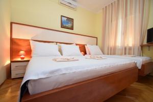 Postel nebo postele na pokoji v ubytování Guest house Podgorje